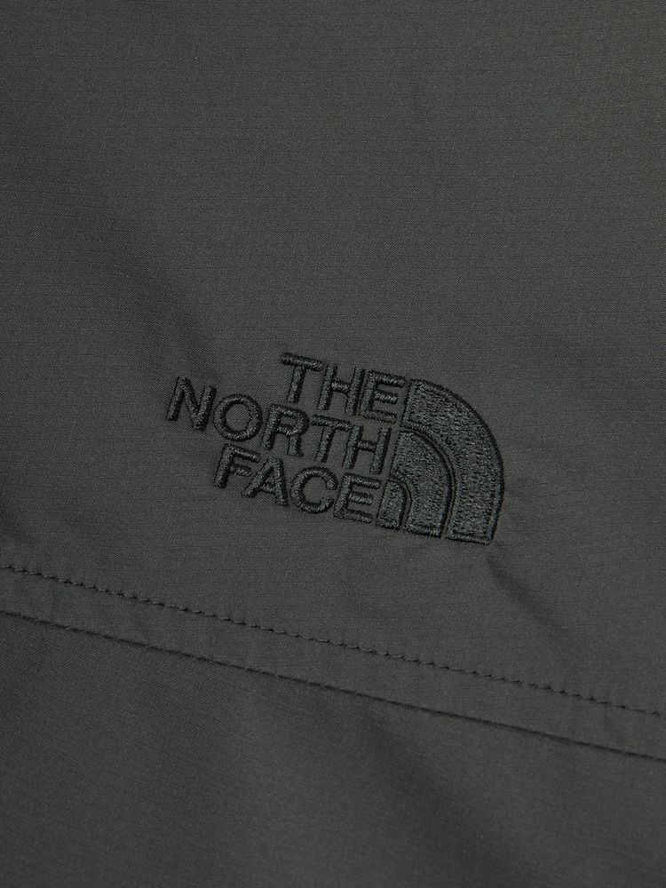 Embroidered logo on the woven side