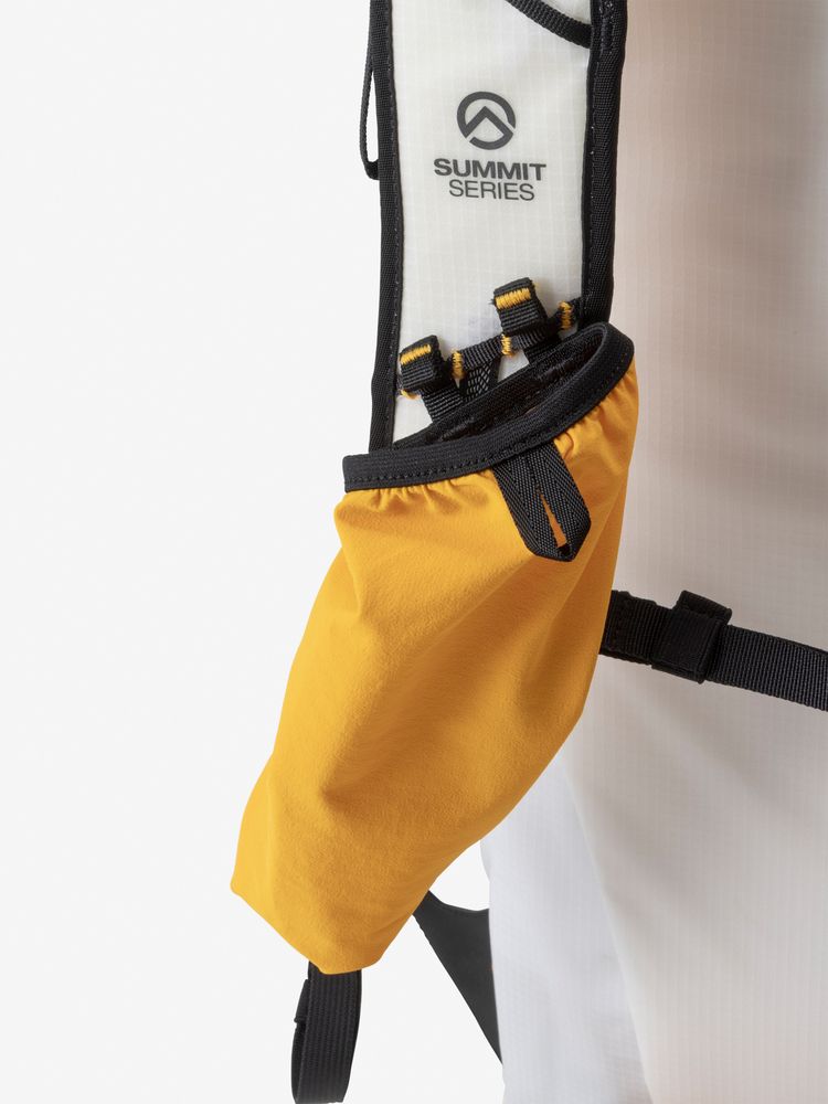 Shoulder harness with a removable bottle pocket