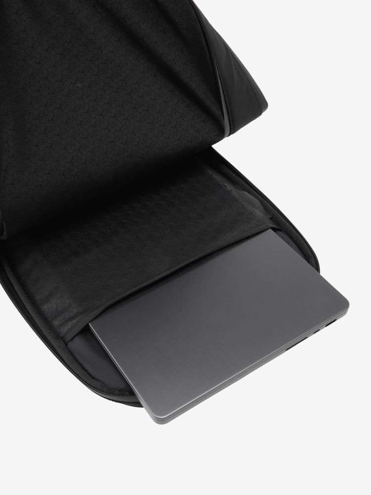 A PC sleeve that accommodates up to approximately 15 inches is placed on the back side.